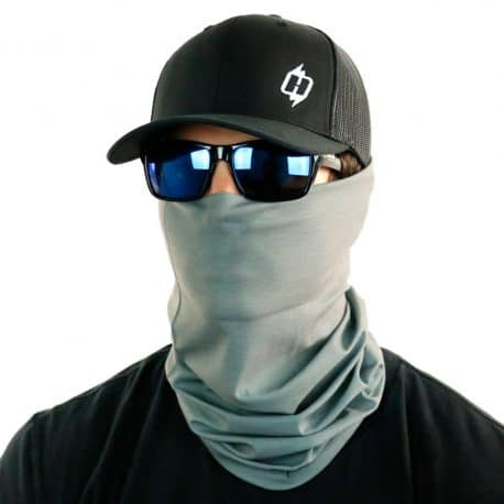 image of male model in a hat, sunglasses and gray color bandana being worn as a face mask