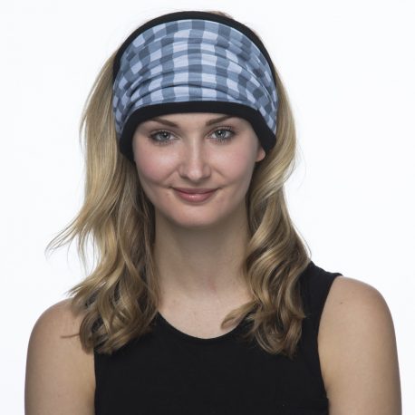 image of female model wearing a fleece lined multifunctional headband in gray and white checked pattern