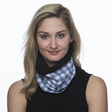 image of female model wearing a fleece lined multifunctional scarf in gray and white checked pattern