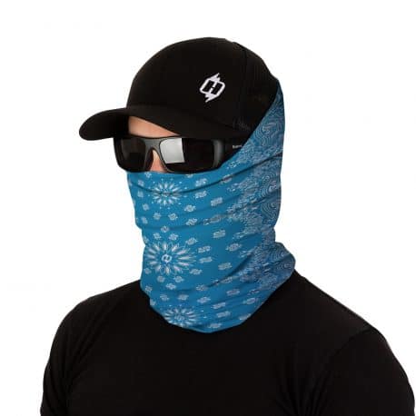 image of male model in a hat, sunglasses and wearing a paisley patterned bandana in light blue