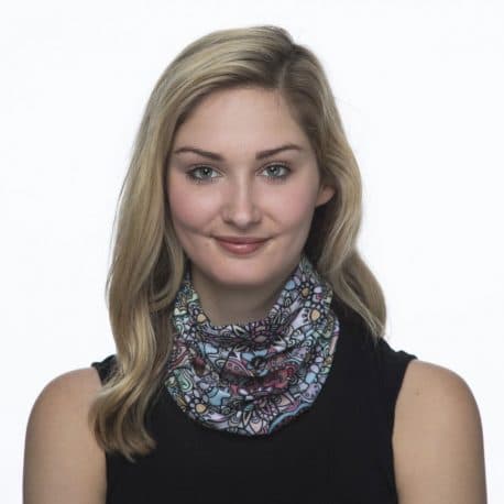 image of a female model wearing a patterned neck gaiter
