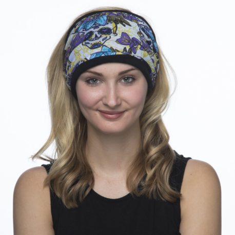 image of a female model wearing a fleece lined multifunctional headband with skulls and purple flowers on the outer layer with black fleece lining