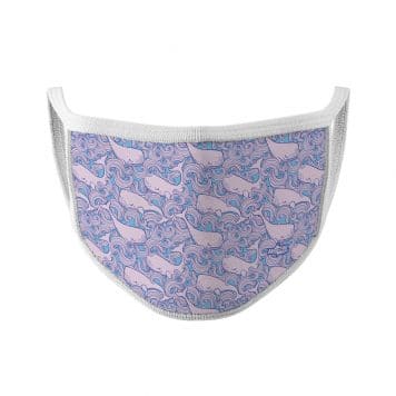 image of an ear loop face mask with pink whales in purple and blue waves. White trim.