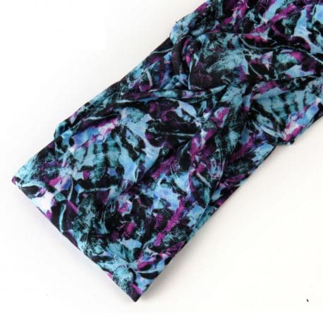 close up of a Purple and Blue Tropical Flower Twisted Knot Headband